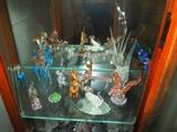 Part of large delightful colored blown glass collection filling two cabinets w/ cabinets for sale also.