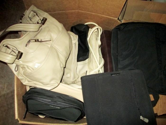 Big box of like new ladies leather bags and other portable accessories