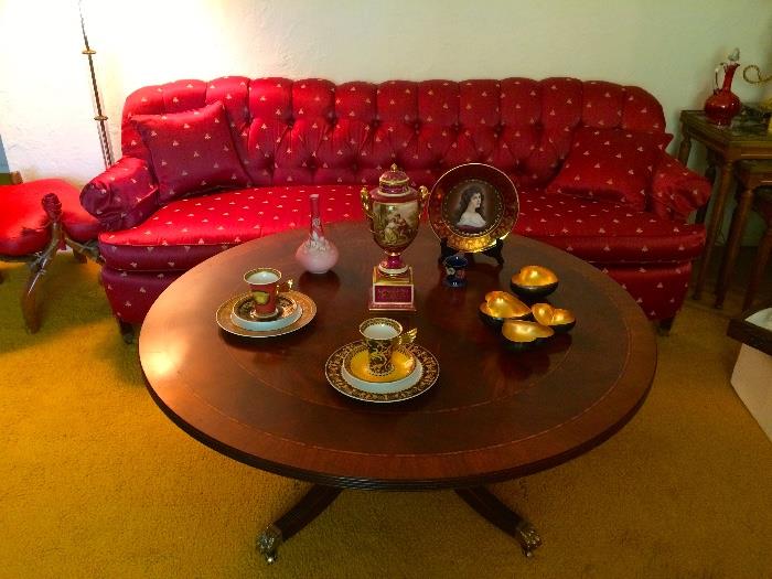 Round Mahogany Inlaid Banded Henkel Harris Coffee Table with Lion Feet and Casters, Couch Upholstered in Small Napoleonic Bee Print with Button Tucked Back, Versace Coffee Sets, Peach Blow Vase, Bavarian Portrait Plate, Scenic Victorian Urn and More!