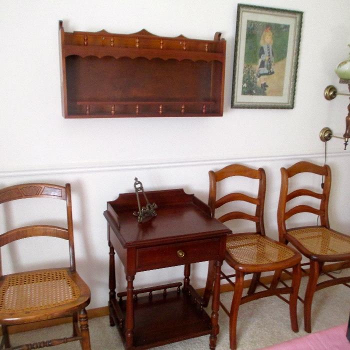 Cherry shelf and one drawer stand, caned seat chairs
