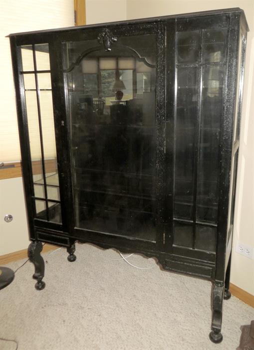 Antique black glass cabinet