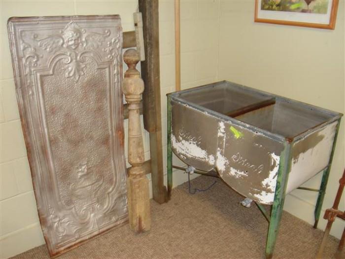Ornate tin ceiling panel, newel post and antique washtub