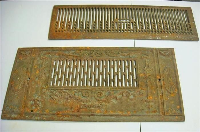 Ornate antique cast iron panels from  an old boiler are another example of the architectural salvage in this auction.