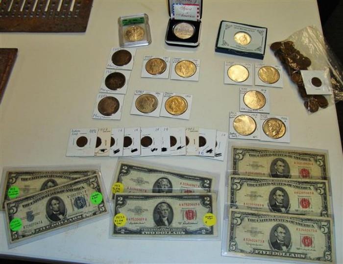 Numerous lots of collectible coins in this auction include silver Morgan and Peace dollars, 2 and 5 dollar red seal bill along with silver certificates, very nice silver trade dollar, 1 oz silver proofs and  even some Roman empire coins