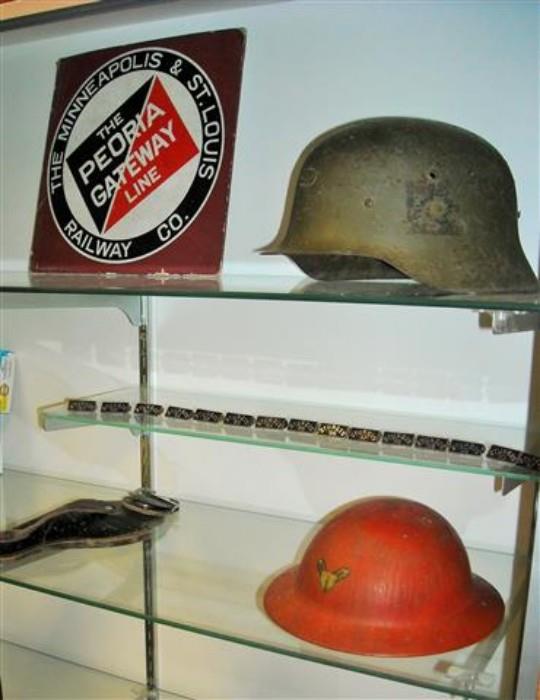 German helmet, Railroad sign and  childs play WWI dough boy helmet.  