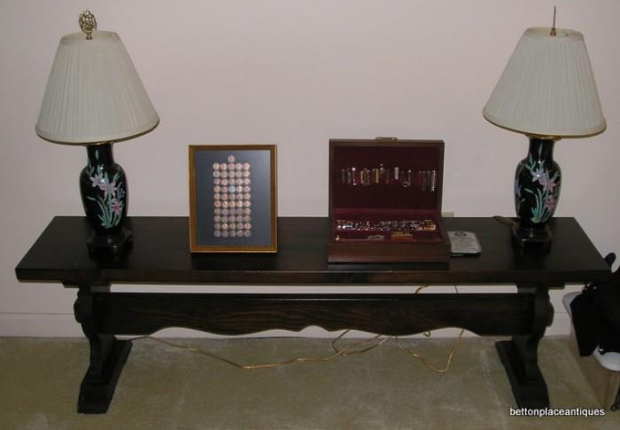 Bench primitive style with pair cloisonne lamps, coins and jewelry