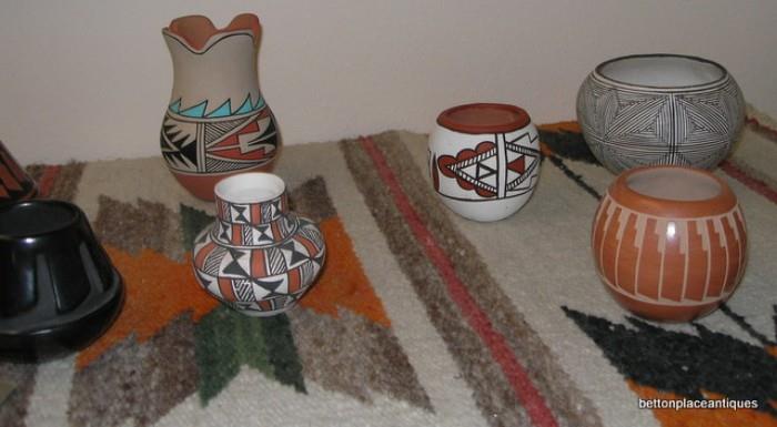 Miniature pottery pieces..including Jemez, Acoma, L Jemez, J Lano Acoma, Juanita Jemez , Christina Navajo Santa Clara and more