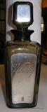 L'Etain a la Rose Whiskey Bottle with silver front and silver on stopper...