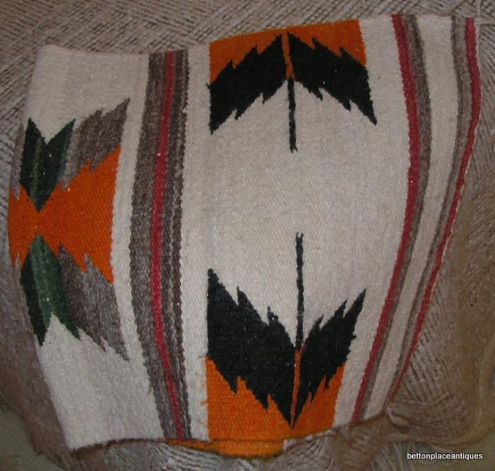 native american floor rug folded in half to show pattern