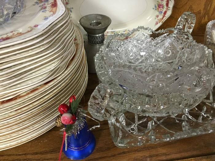 Lots of pretty crystal serving pieces, pewter candlesticks