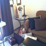 Round black and glass side table ... can be used outdoors for spring/summer months.