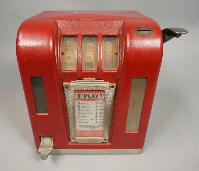 Lot 52:  Penny Slot Machine Trade Stimulator. Win Cigarettes. Old Gold, Fatima, Camel. : Dimensions:  H: 10.25 inches: W: 10 inches: D: 8 inches --- US Shipping charge: $50