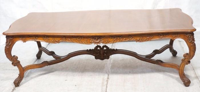 Lot 123:  Large Country French Dining Table.  Carved skirt and stretcher.   Shaped top.: Dimensions:  H: 30.25 inches: W: 98 inches: D: 47 inches --- 