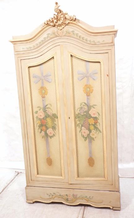 Lot 130:  Painted Country French Style Armoire with Interior Shelves.  Drawer bottom.  Carved Top. Floral painting.  Wire mesh doors.: Dimensions:  H: 94 inches: W: 45 inches: D: 18 inches --- 