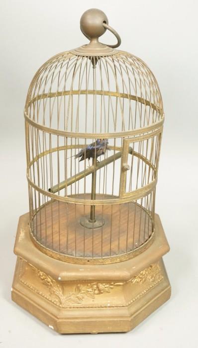 Lot 201:  Antique Automaton Mechanical Music box Bird Cage.  Metal birdcage on gilt wood base.  Working.: Dimensions:  H: 20.5 inches: W: 11.5 inches --- 