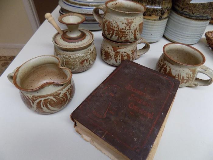 artisan pottery...creamer, honey pot, cups, and vintage cookbook