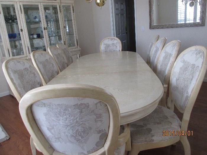 Dining Table Extended with 2 Leaves comfortably seating 10, Eight Side Chairs and 2 Captains Chairs
