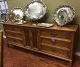 Thomasville dressers and lots of silver plate trays.