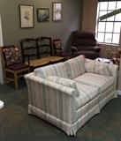 In Bargainville -- Frederick Edwards loveseat, rush bench, brown Lazyboy recliner, and art!