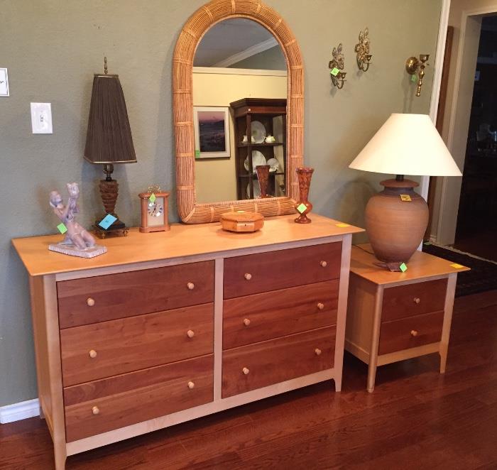 Copeland dresser and nightstand, pottery lamp, rattan mirror.