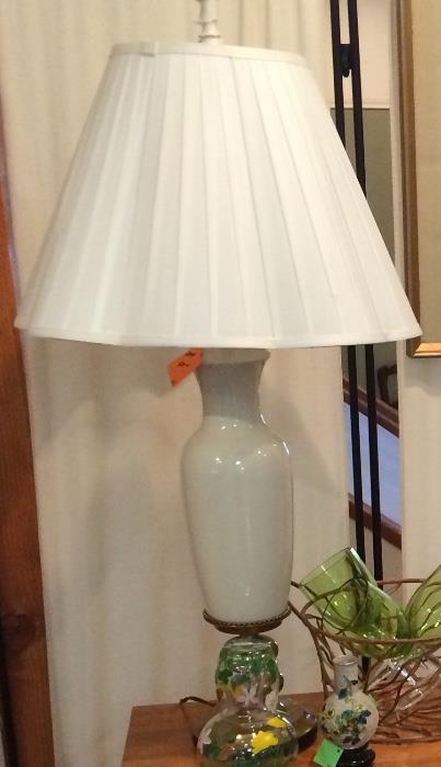 White lamp with brass base