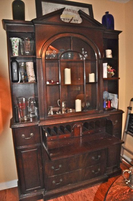 Mahogany, 6-drawer arched secretary desk with glass doors (with seal: Artists in Mahogany - Colonial Manufacturing Company, Zeeland Michigan)