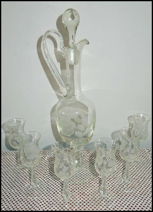 Decanter and wheel cut glasses