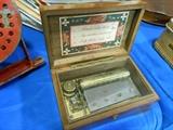 Swiss Music box plays 3 songs