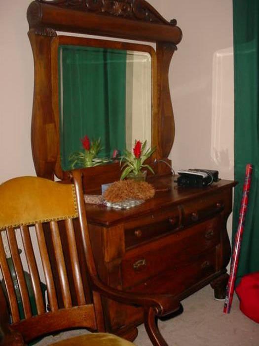 Beautiful antique dresser with large back mirror, plus the antique oak rocker