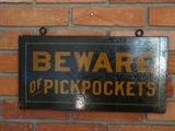 Beware of Pickpockets sign in Checkout area