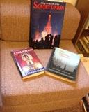 Books top the fold out chair/bed pads