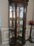 CURIO CABINET AND LOTS OF HUMMELS