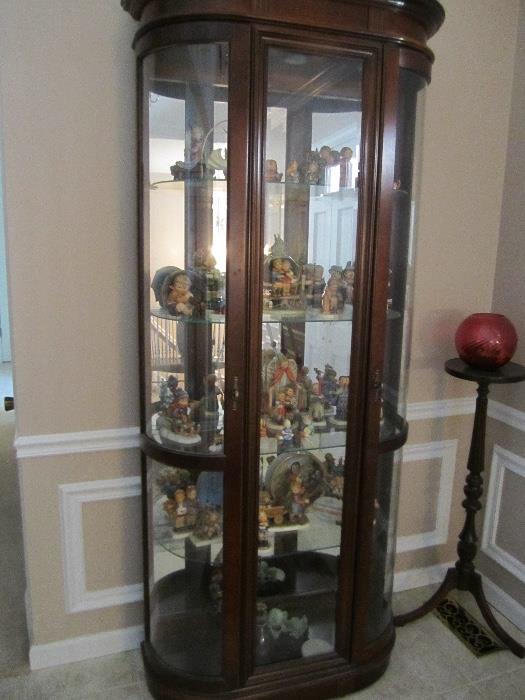 CURIO CABINET AND LOTS OF HUMMELS