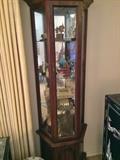 2 very nice lighted curio cabinets