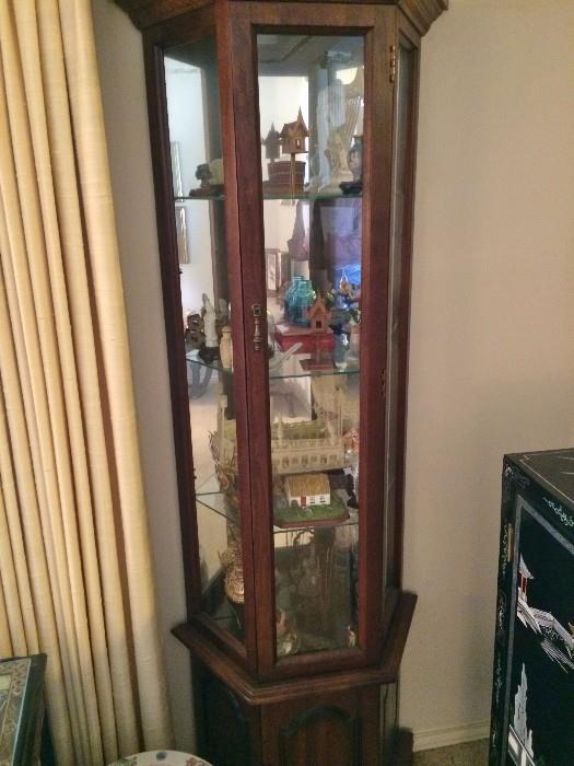 2 very nice lighted curio cabinets