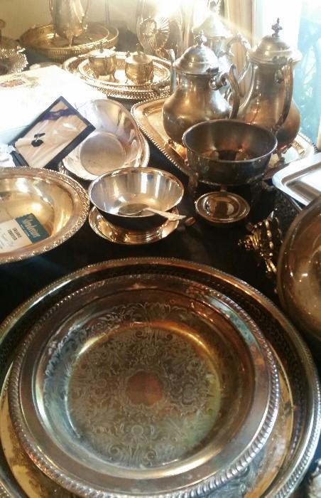 Tables full of Silver Plate (Tea Pots, Trays, etc...)