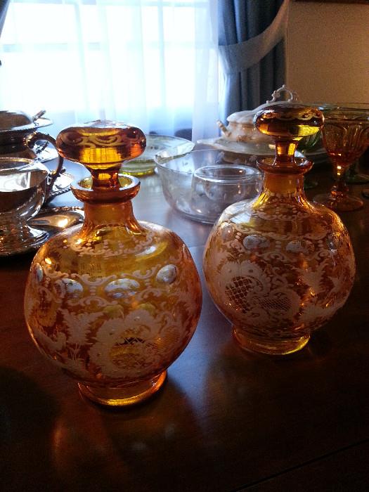 Beautiful etched amber glass decanters
