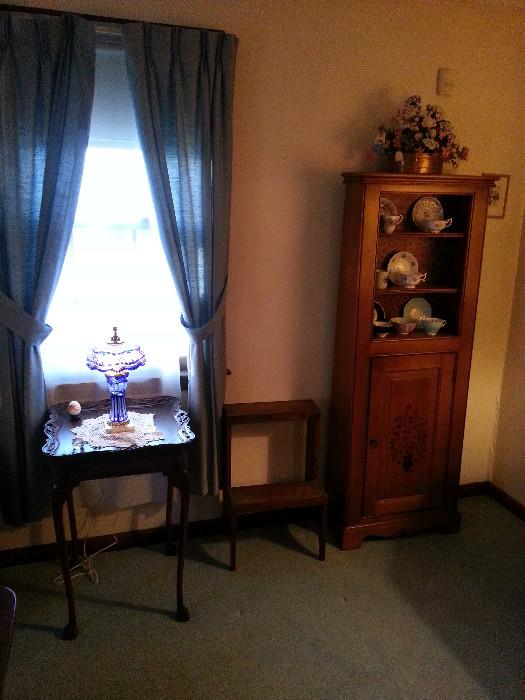 Occasional table and curio cabinet