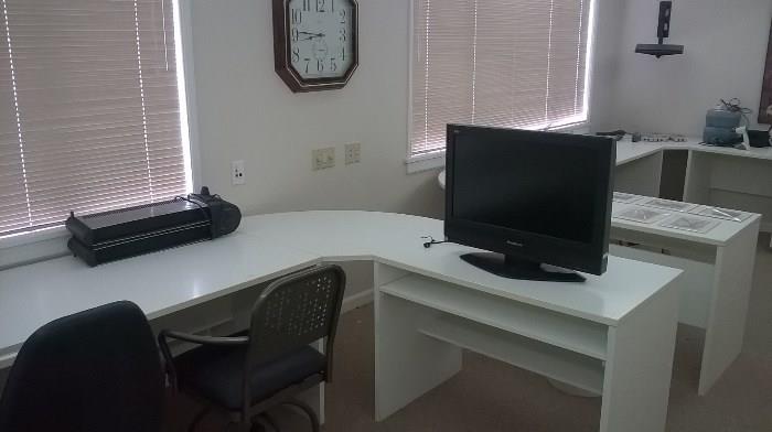 A two person home office set up withtwo large desks, a filing cabinet and bookcases that match.  Flat screen, wall clock and chairs also for sale
