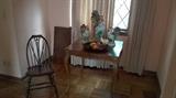 Antique chair and a great game table with a leaf to extend for more dining space