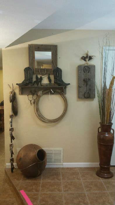 Indian decorative walking stick, clay pot with cowhide details, lasso, old spurs, vase with reeds