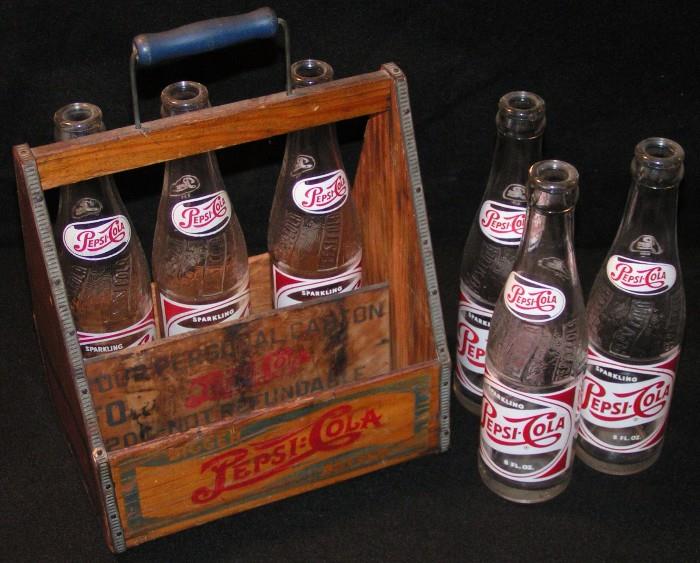 Pepsi Cola crate carrier with vintage bottles