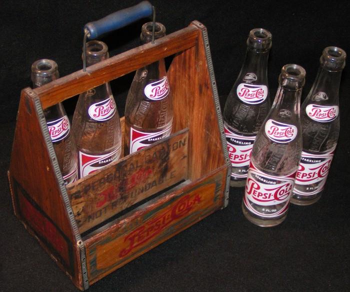 Pepsi Cola crate carrier with vintage bottles