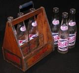 Pepsi Cola crate carrier with vintage bottles