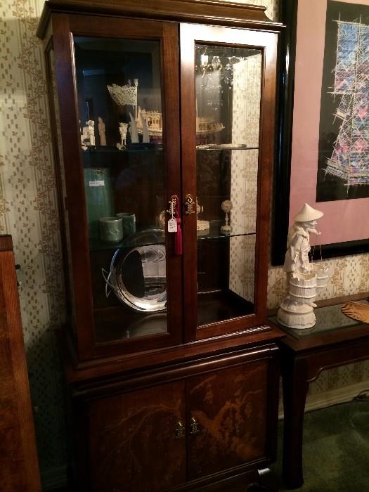               One of two china cabinets