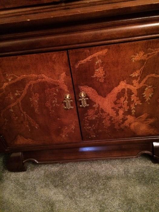        Beautifully etched doors of the china cabinet