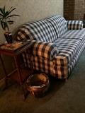                Checked blue & white sofa
