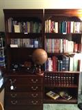Two of several book shelves; wonderful leather globe