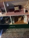       Back of the other doll house; doll furniture