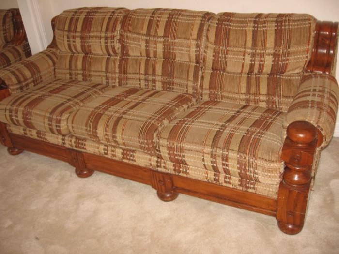 early American-style couch with matching chair and ottoman